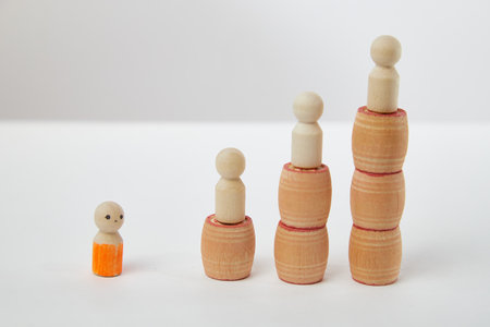 Three wooden figures on high pedestals and one separately near them. The difficulty of starting the...