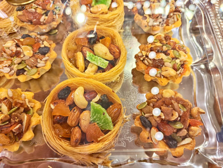 Various types or many colorful assortment of Turkish sweets for sale in shop food festival. Baklava...