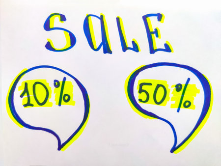 White sign with a yellow and blue inscription sale. The concept of a sale offer in business, trade, store. Blackboard with the word sale handwritten on it isolated against a white backgroundの写真素材