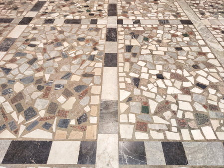 Variegated tiled surface demonstrating a complex pattern design. Background, texture, pattern, place for textの写真素材