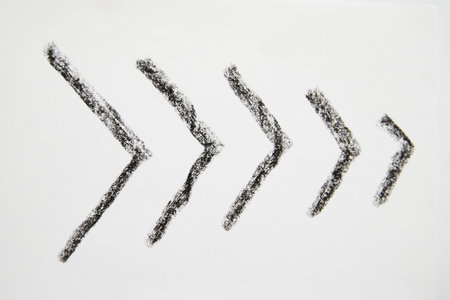 Many graceful smooth Hand drawn black chalk arrows. Concept of business, choosing direction, moving...