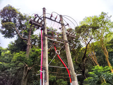 Old pole with wires against the sky. Electric transmission line, Eco-friendly energy