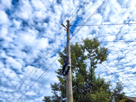 Old pole with wires against the sky. Electric transmission line, Eco-friendly energy