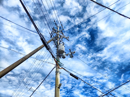 Pole with wires against the sky. Electric transmission lineの写真素材