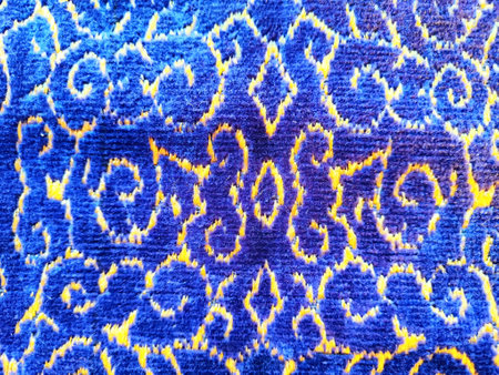 Beautiful blue and yellow textured pattern featuring swirling designs, ideal for creative projects...