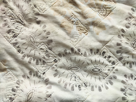 Subtle textile pattern features intricate details and textures, ideal for creative projects needing...