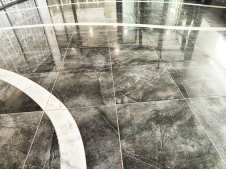 Luxurious marble flooring showcases detailed textures and patterns, enhancing the ambiance of a contemporary indoor environment.の写真素材
