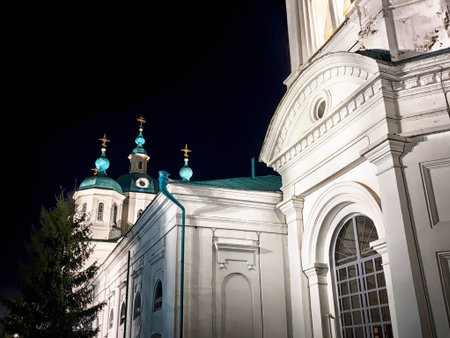 The church stands out at night with glowing domes and intricate architectural features, creating a serene atmosphere in the quietude.の写真素材