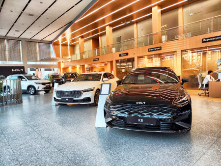 Tashkent, Uzbekistan - April 12, 2025: Cars in showroom of dealership KIAのeditorial素材