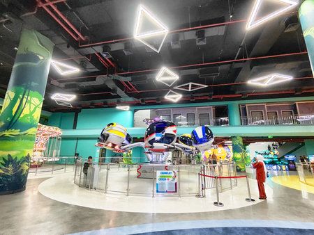 Tashkent, Uzbekistan - April 09, 2025: Visitors enjoy vibrant rides and attractions at Magic City, a lively entertainment center in Tashkent, Uzbekistan, filled with joy.のeditorial素材