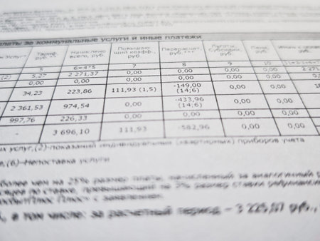 Kirov, Russia - February 20, 2026: Documents show utility bills and calculations for monthly...