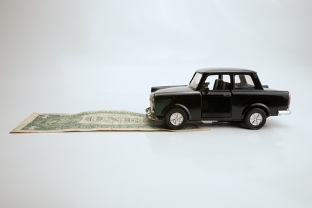 Toy old car for one dollarの写真素材