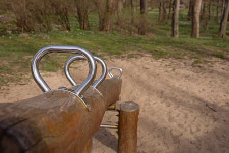 Silver seesaw on a playgroundの写真素材