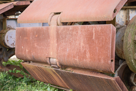 Rusty wheels of big backhoeの写真素材