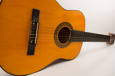 Acoustic guitar isolated on white backgroundの写真素材