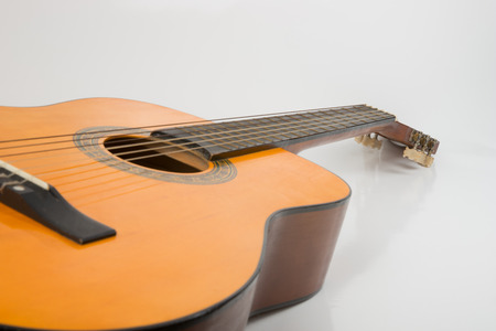 Acoustic guitar isolated on white backgroundの写真素材
