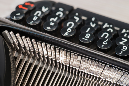 Closeup of old typewriter letter and symbol keysの写真素材