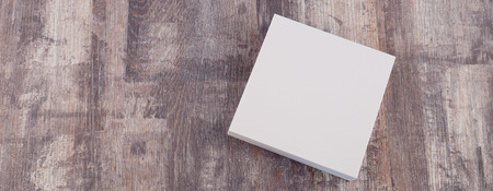 Blank paper on wood tableの写真素材