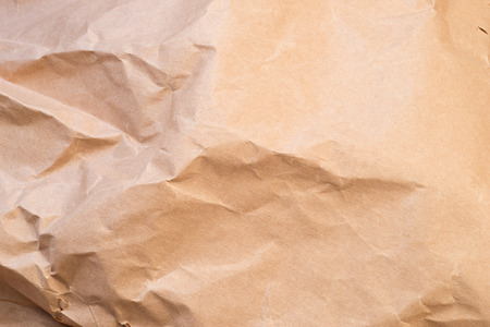 Closeup of brown wrinkled paper texture backgroundの写真素材