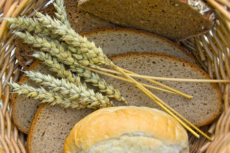 Bread and rolls in wicker basket