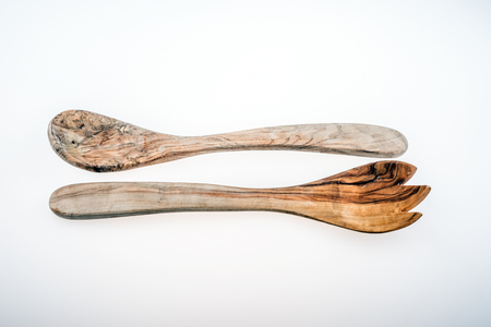 Old wooden spoon and wooden fork isolatedの写真素材