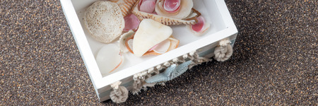 Treasure chest on dark sand - concept of holiday, beach and summerの写真素材