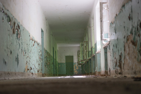 Dark corridor, light and shadow, mysterious and dangerous placeの写真素材