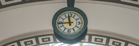 Hanging public clock, the clock hanging above the arch