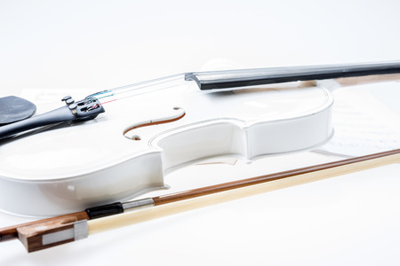 White and black violin isolated on white backgroundの写真素材