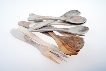 Old wooden spoon and wooden fork isolatedの写真素材