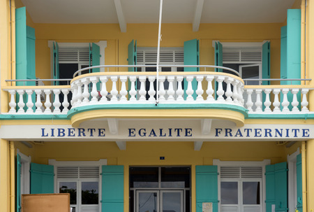 Words in French, Liberte, Egalite, Fraternite under a balconyの写真素材