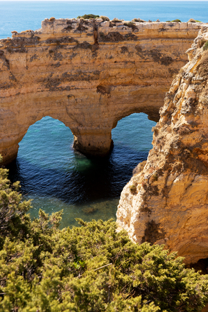Cliffs at the beach praia da Marinha, Algarve, Portugalの写真素材
