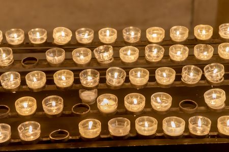Group Of Candles In Church. Candles Light Backgroundの写真素材