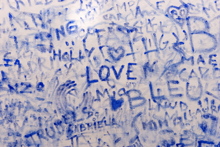 Graffiti pattern, background in blue color with word loveの写真素材