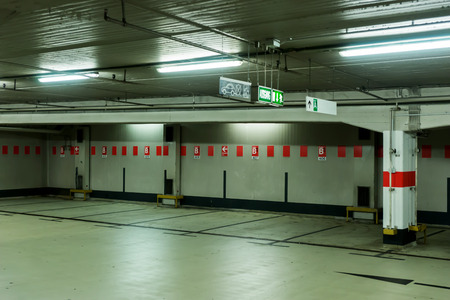 Underground car park in Cologne with sign for the exit