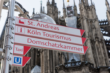 Tourist direction sign in cologne, city center, Germany