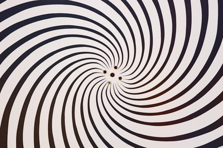 Hypnotize background. Swirling radial pattern backgroundの写真素材