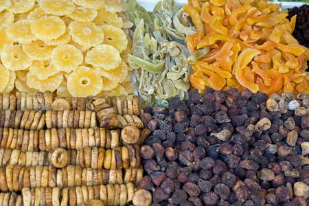 Various colorful candied and crystallized fruits in fruit market on Madeira islandの写真素材
