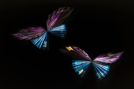 Euro notes in the form of butterfliesの写真素材