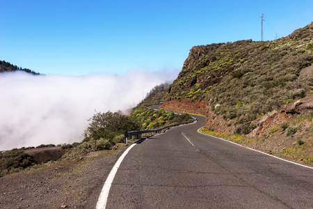 Fog above the road in the mountains of Gran Canariaの写真素材