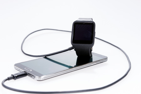 Data synchronization between smartwatch and smartphoneの写真素材