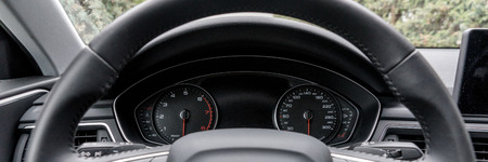 Modern black car instrument panel with different displaysの写真素材