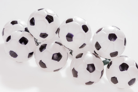 Group of black and white soccer ballsの写真素材