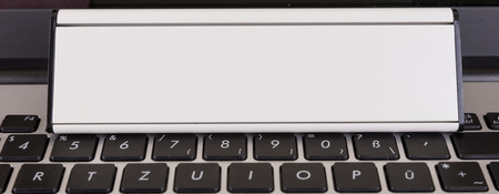 Laptop keyboard with blank sign for your textの写真素材