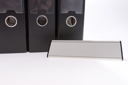 Office with file folder and blank sign for your text