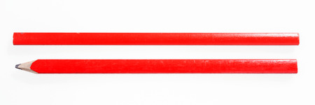 Two red construction pencils isolated on white backgroundの写真素材