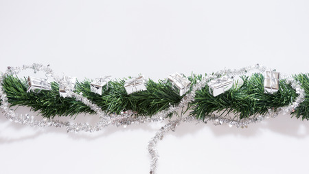 Christmas garland with silver gift boxes. Christmas decorationの写真素材