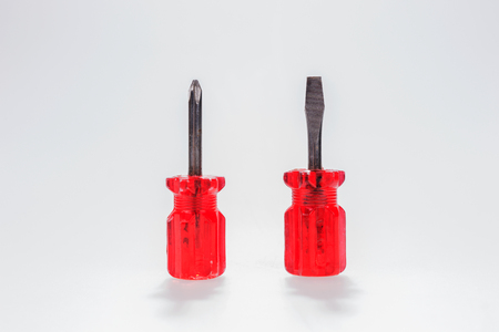 Two small screwdrivers isolated on white backgroundの写真素材