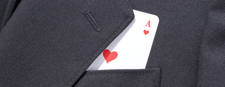 Ace of hearts in business suit man black suit pocket