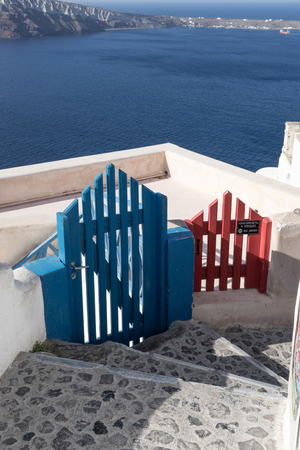 Two different colorful gates in Oia, Santoriniの写真素材